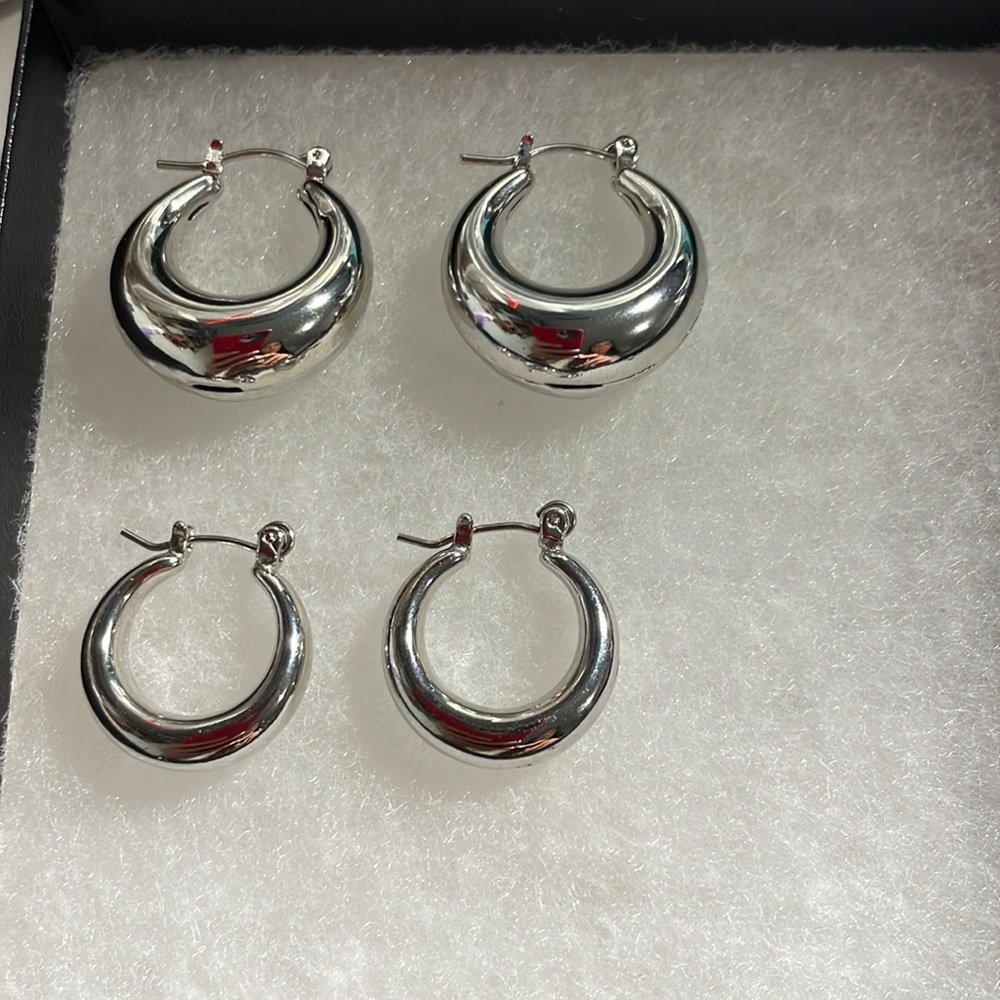 Two pairs of silver chunky hoops